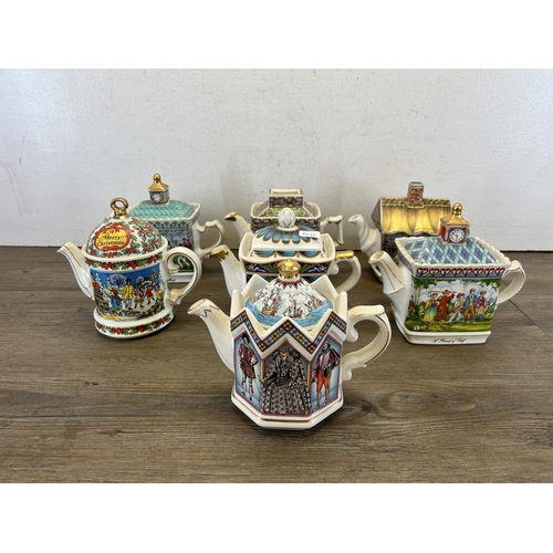 389 - Seven Sadler Pottery teapots