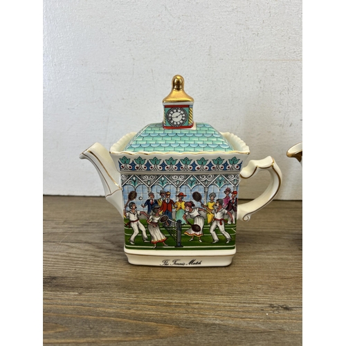 389 - Seven Sadler Pottery teapots