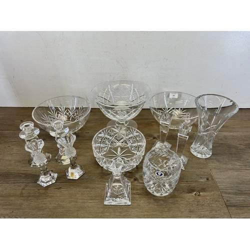 390 - A collection of glassware to include two pairs of Nachtmann candlesticks, circular pedestal bowl etc... 