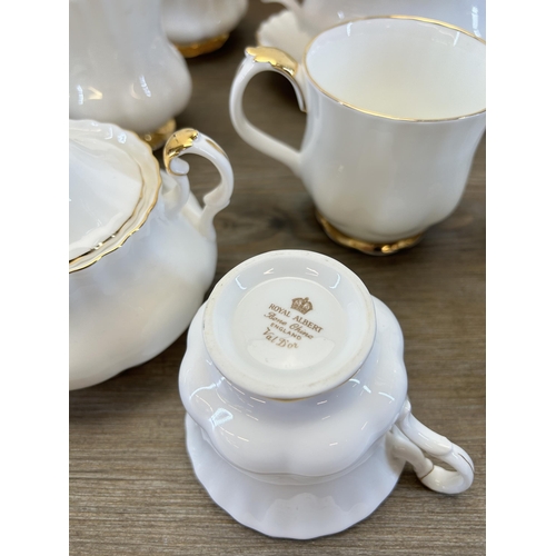 392 - A collection of Royal Albert Val D'or bone china