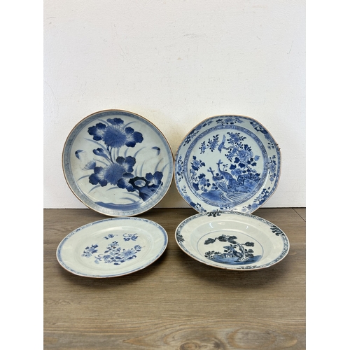 395 - Four 18th/19th century Chinese blue and white porcelain chargers and plates - largest approx. 29cm d... 