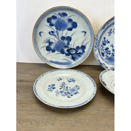 395 - Four 18th/19th century Chinese blue and white porcelain chargers and plates - largest approx. 29cm d... 