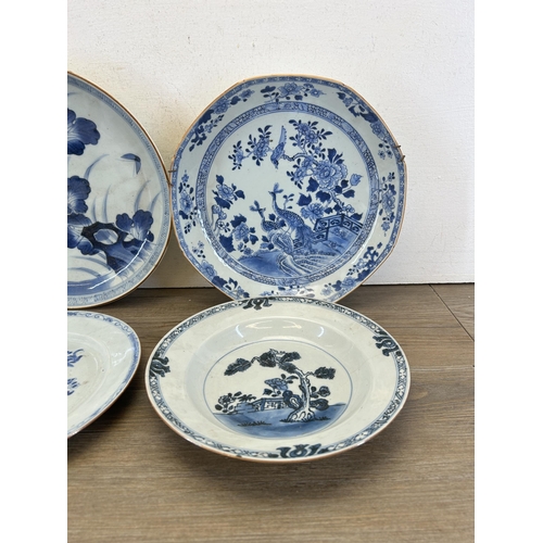 395 - Four 18th/19th century Chinese blue and white porcelain chargers and plates - largest approx. 29cm d... 