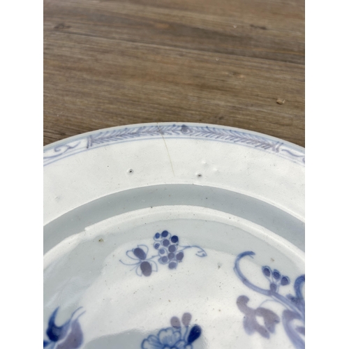 395 - Four 18th/19th century Chinese blue and white porcelain chargers and plates - largest approx. 29cm d... 