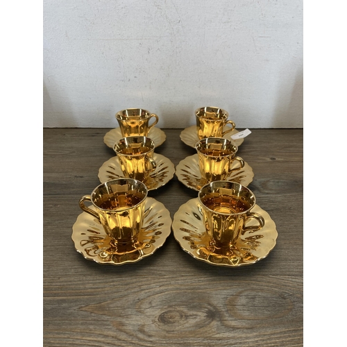 350 - Seventeen pieces of Wade pottery, Gold Lustre fourteen-piece coffee set and Rubytone three-piece tea... 