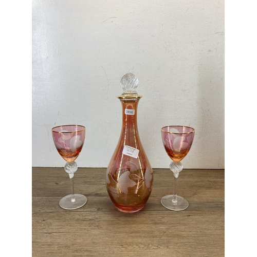 363A - Three pieces of Murano Red and Gold Lustre glassware, two glasses and one decanter