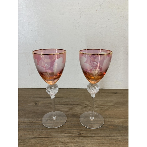 363A - Three pieces of Murano Red and Gold Lustre glassware, two glasses and one decanter