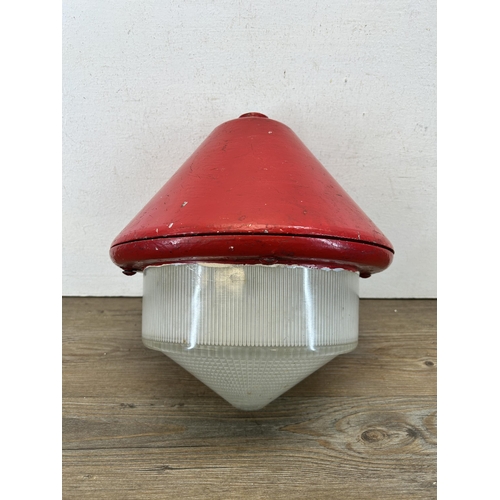 597A - A mid 20th century industrial cast metal and glass pendant downlight - approx. 30cm high