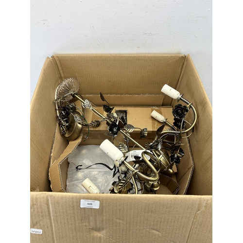 609 - A boxed BHS Lighting brass effect chandelier