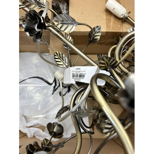 609 - A boxed BHS Lighting brass effect chandelier