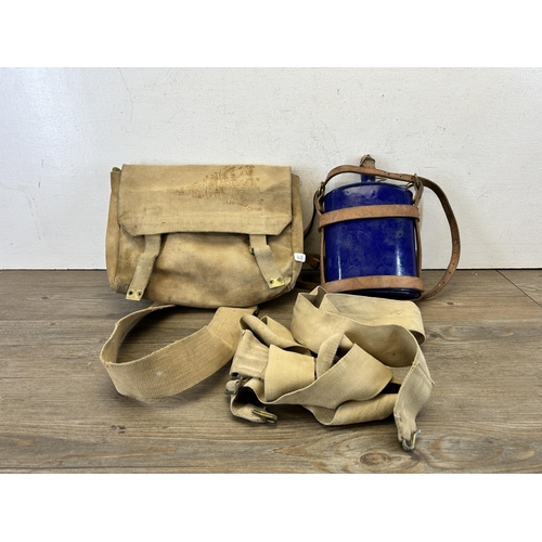 614 - Two pieces of British Army militaria, one WWI 1914 Pattern cobalt blue enamel water canteen - approx... 