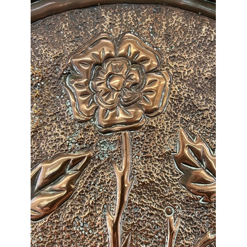 617 - Two pieces of metalware, one antique copper circular plate with floral design - approx. 25cm diamete... 