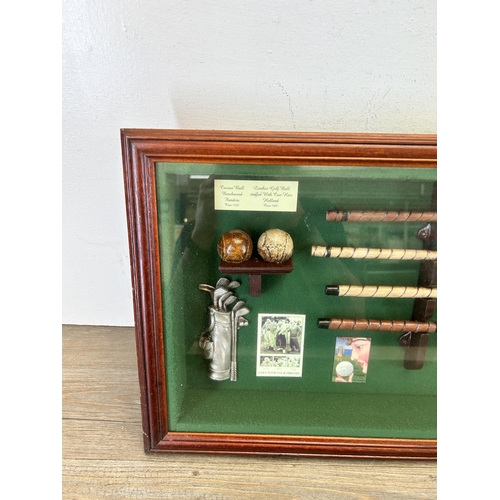 631 - A wooden cased History of Golf golfing diarama - approx. 35cm high x 85cm wide