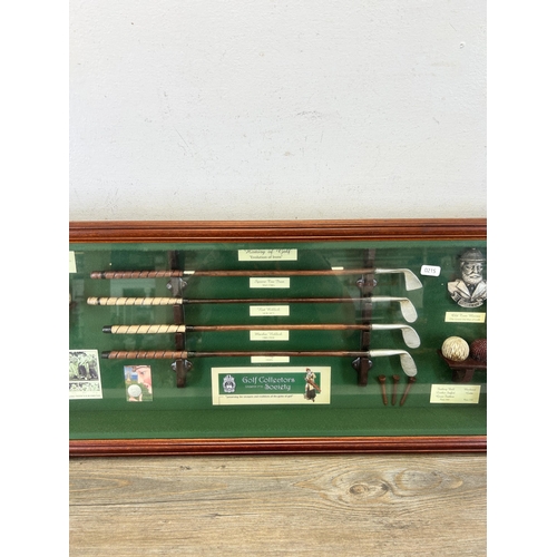 631 - A wooden cased History of Golf golfing diarama - approx. 35cm high x 85cm wide