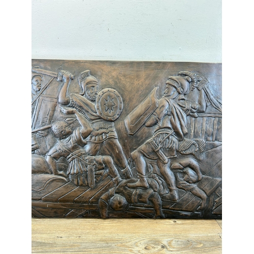 663 - A Thompson fibreglass Roman battle scene sculpture/wall plaque - approx. 39cm high x 98cm wide