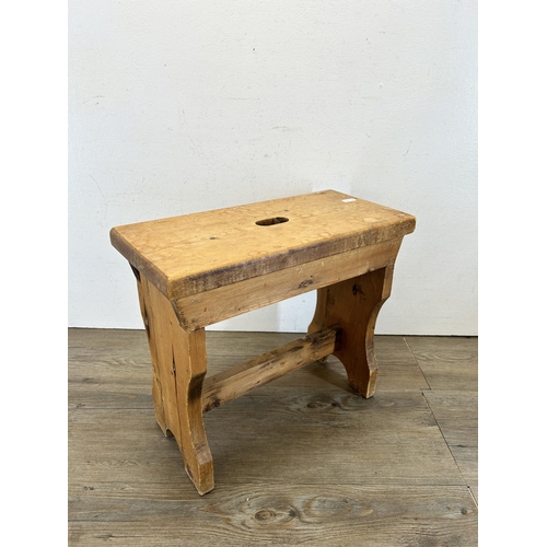 675 - A 19th century style pine farmhouse stool - approx. 35cm high x 19cm wide x 40cm long