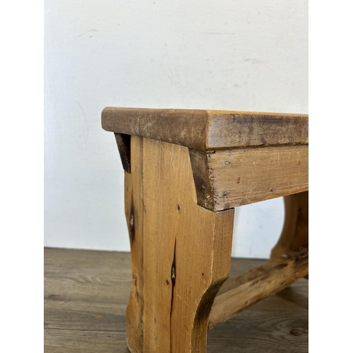 675 - A 19th century style pine farmhouse stool - approx. 35cm high x 19cm wide x 40cm long