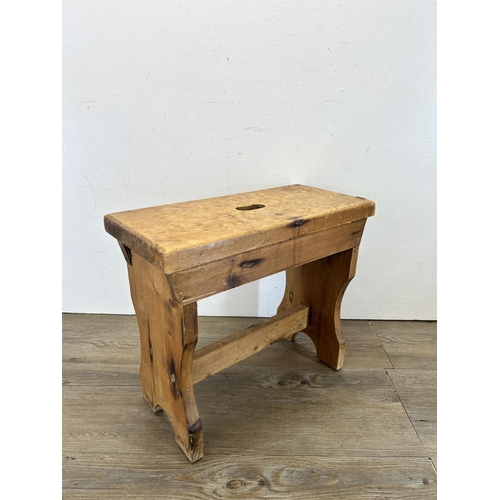 676 - A 19th century style pine farmhouse stool - approx. 35cm high x 19cm wide x 40cm long