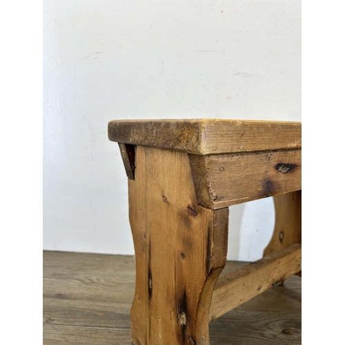 676 - A 19th century style pine farmhouse stool - approx. 35cm high x 19cm wide x 40cm long