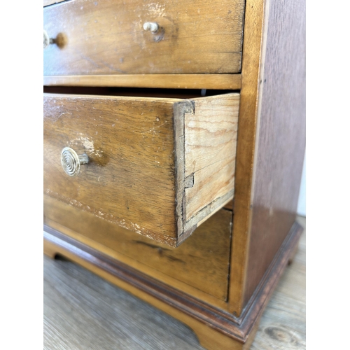 679 - An early 20th century mahogany and satinwood apprentice chest of drawers - approx. 34cm high x 27cm ... 