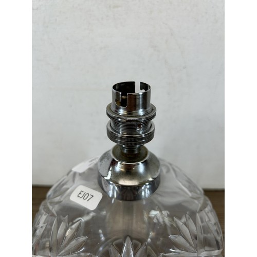 596 - A mid 20th century cut glass table lamp - approx. 23cm high