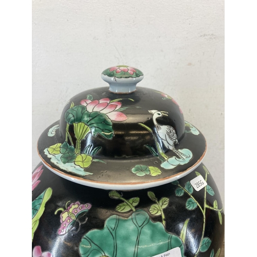 405 - A Chinese hand painted porcelain ginger jar and cover - approx. 42cm high