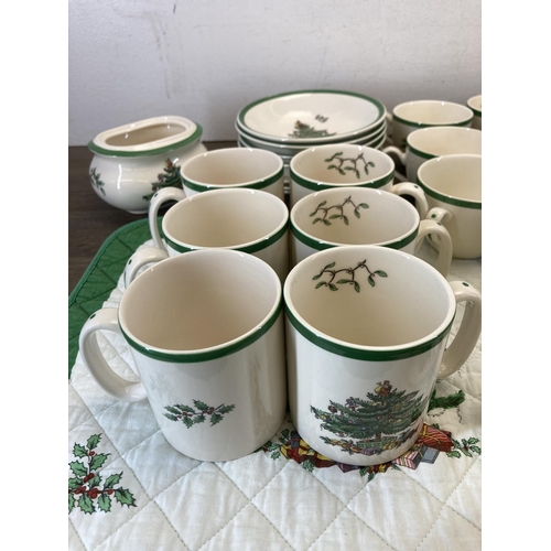 407 - A collection of Spode Christmas Tree china to include salt and pepper shakers, pair of candlesticks,... 