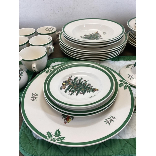 407 - A collection of Spode Christmas Tree china to include salt and pepper shakers, pair of candlesticks,... 