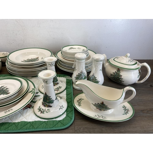 407 - A collection of Spode Christmas Tree china to include salt and pepper shakers, pair of candlesticks,... 