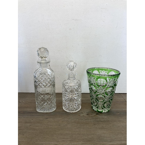 415 - Nine pieces of glassware to include Victorian cranberry glass lustre vase, Bohemian green cut glass ... 