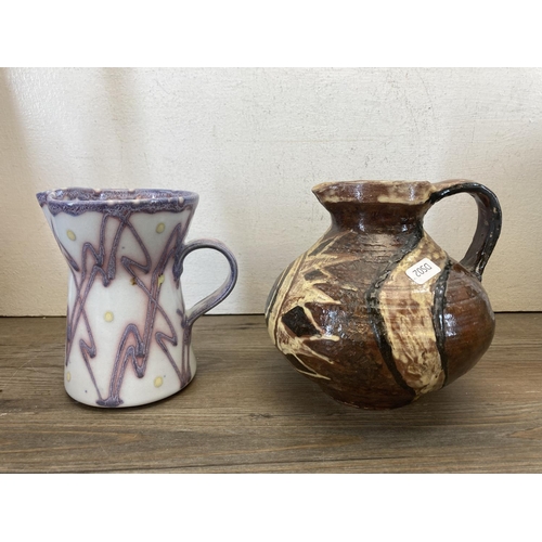 416 - Eleven pieces of studio pottery to include Lower Mill Studio Jersey seven-piece drinking set, purple... 