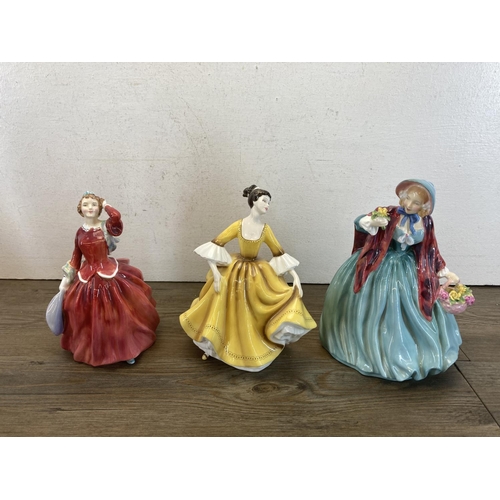 417A - Nine Royal Doulton figurines, Clarissa - HN 2345, The Ermine Coat - HN 1981, Babie - HN 1679, Michel... 