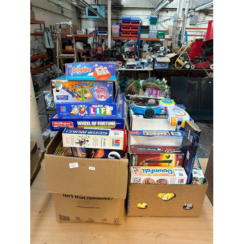 499B - Two boxes containing a large collection of toys and boxed board games to include Bopp It, Frustratio... 