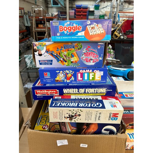 499B - Two boxes containing a large collection of toys and boxed board games to include Bopp It, Frustratio... 