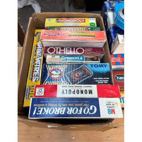 499B - Two boxes containing a large collection of toys and boxed board games to include Bopp It, Frustratio... 