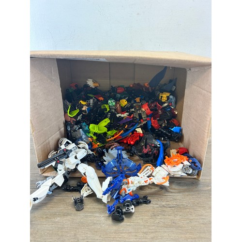 499C - A box containing a large collection of Lego Bionicle to include Storm Troopers etc.