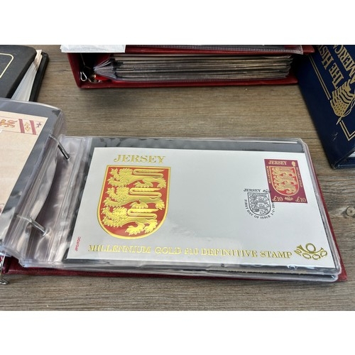 594 - Nine first day cover albums containing first day covers