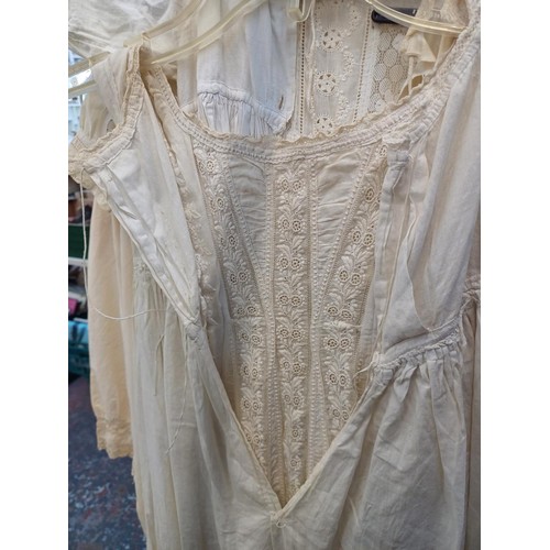 538A - Seven items of clothing, six Victorian floral embroidered under garments and one vintage Marldena ev... 