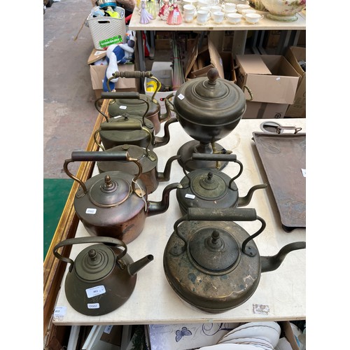 461 - Eight pieces of Victorian metalware, seven kettles and one samovar