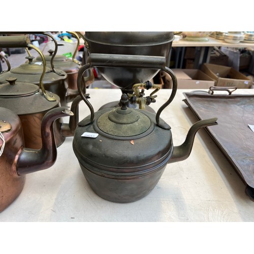 461 - Eight pieces of Victorian metalware, seven kettles and one samovar