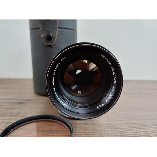 532 - A cased Konica Hexanon AR 135mm F3.2 lens