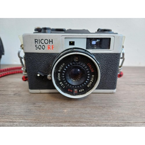 528 - A cased 1970s Ricoh 500 RF 35mm rangefinder camera