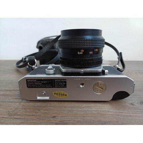 529 - A cased 1970s Konica Autoreflex T3 35mm SLR camera fitted with Hexanon AR F1.7 50mm lens with instru... 