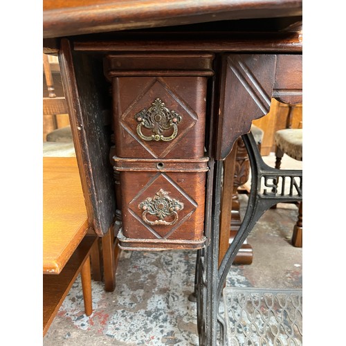 30 - A late Victorian Singer mahogany and cast iron treadle sewing machine, dated 1901 - serial no. P4703... 