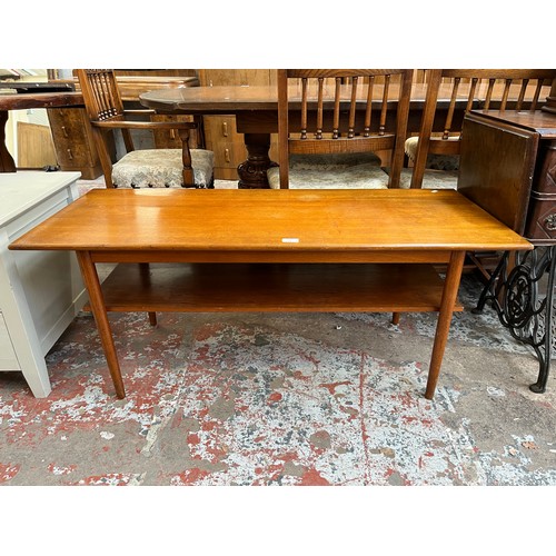 31 - A mid 20th century teak rectangular two tier coffee table - approx. 50cm high x 50cm wide x 120cm lo... 