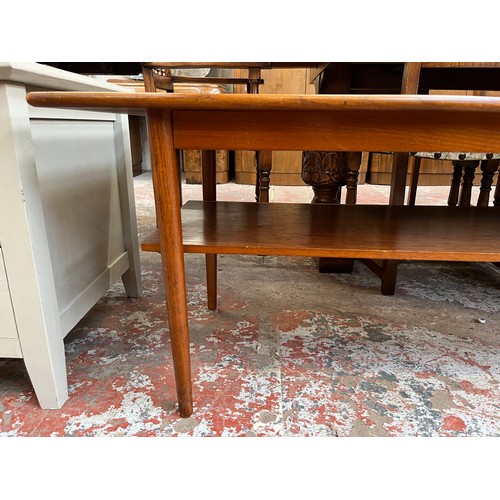 31 - A mid 20th century teak rectangular two tier coffee table - approx. 50cm high x 50cm wide x 120cm lo... 