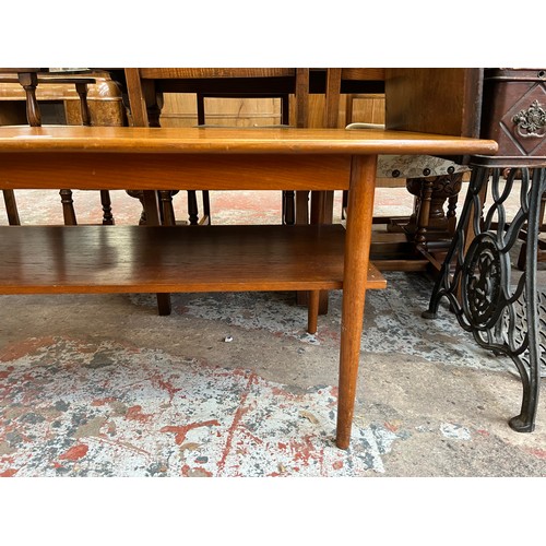 31 - A mid 20th century teak rectangular two tier coffee table - approx. 50cm high x 50cm wide x 120cm lo... 