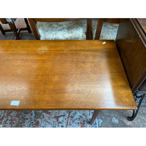 31 - A mid 20th century teak rectangular two tier coffee table - approx. 50cm high x 50cm wide x 120cm lo... 