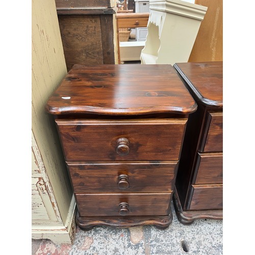 70 - A pair of pine bedside chests of drawers - approx. 67cm high x 46cm wide x 42cm deep