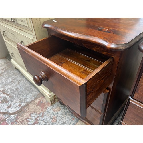 70 - A pair of pine bedside chests of drawers - approx. 67cm high x 46cm wide x 42cm deep